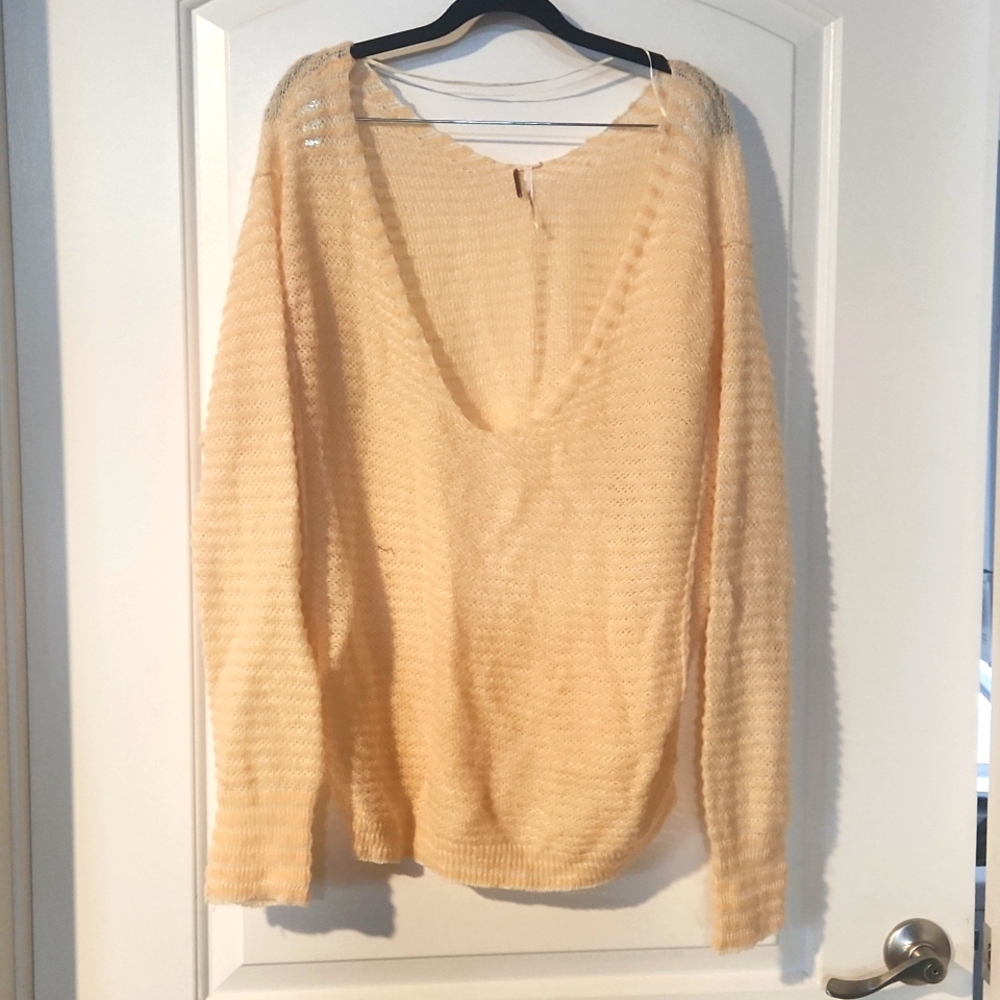 Free People oversized sweater. Lg. V neck.  Peach